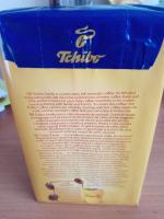 Натуральный жареный молотый кофе Tchibo Family среднеобжаренный фото