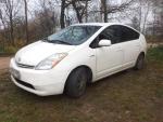 Автомобиль Toyota Prius - хэтчбек фото