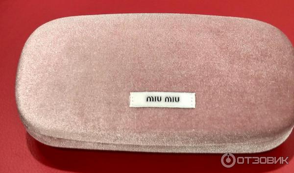 Солнцезащитные очки MiuMiu фото