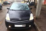 Автомобиль Toyota Prius - хэтчбек фото