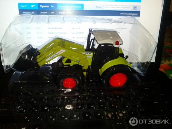 Игрушка Mobicaro трактор с фронтальным погрузчиком Claas Arion 540 фото