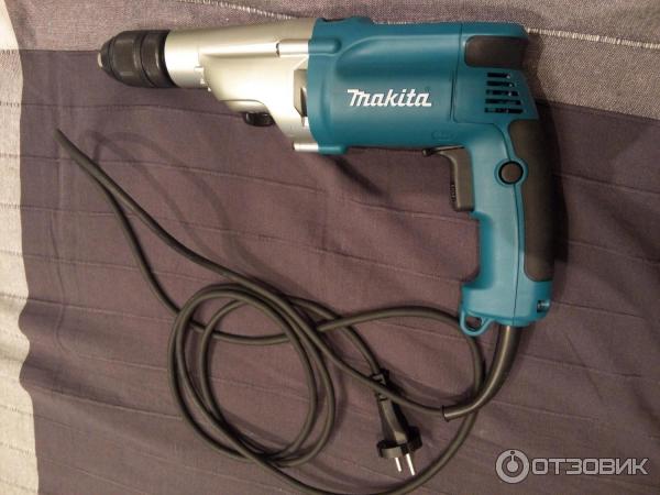 Дрель ударная Makita HP2051F фото