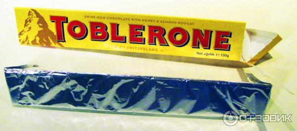 Швейцарский молочный шоколад Toblerone с медово-миндальной нугой фото