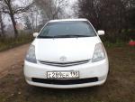 Автомобиль Toyota Prius - хэтчбек фото