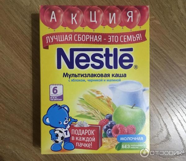 Каша молочная мультизлаковая Nestle с яблоком, черникой и малиной фото