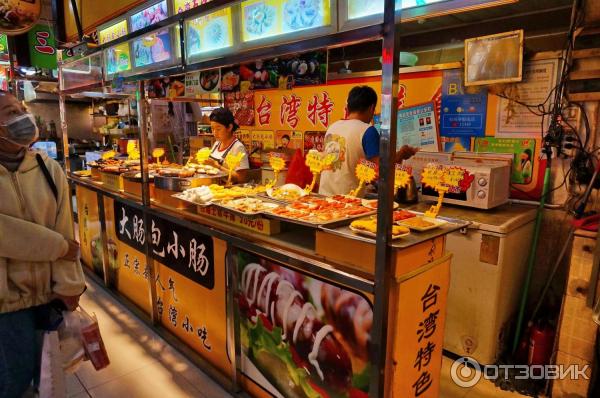 Сеть общественного питания Город закусок Jiefang Road snak city (Китай о. Хайнань) фото