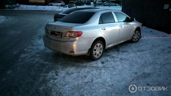 Автомобиль Toyota Corolla E150 седан фото