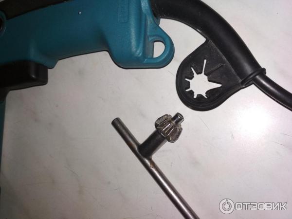 Дрель ударная Makita HP1620 фото