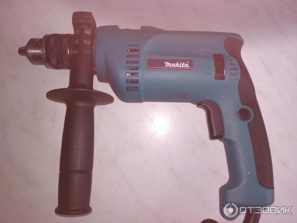 Дрель ударная Makita HP1620 фото