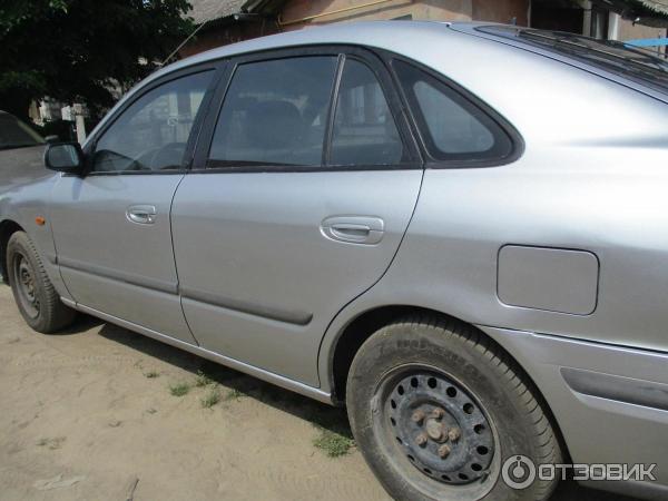 Автомобиль Mazda 626 хэтчбек фото