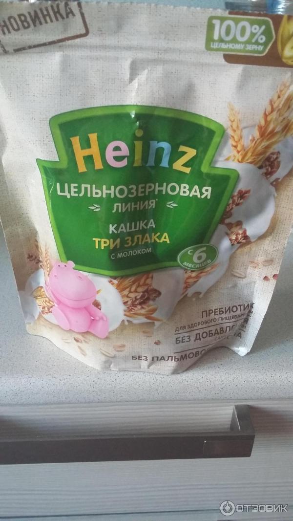 Каша Heinz Цельнозерновая линия Кашка три злака с молоком фото