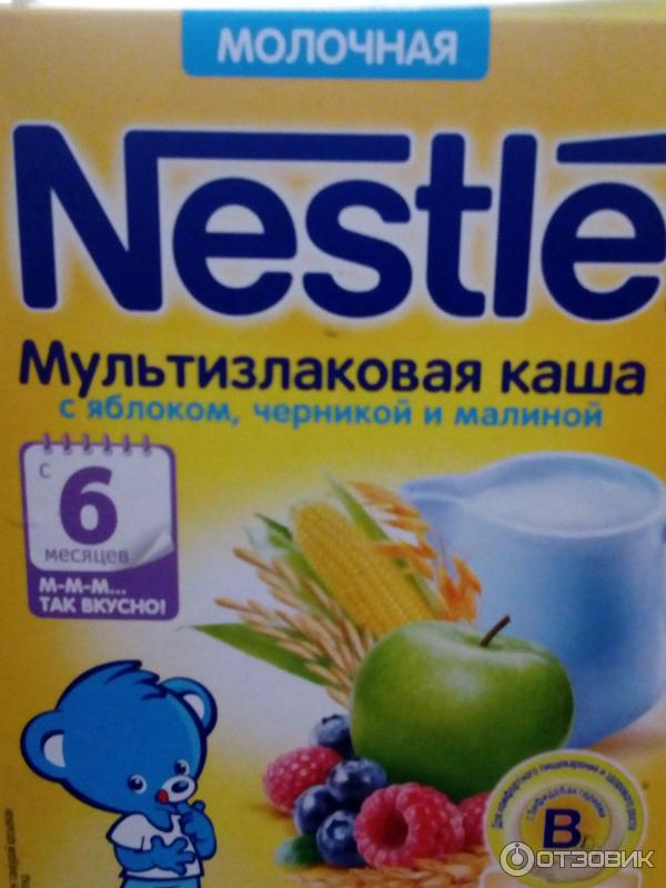 Мультизлаковая молочная каша Nestle с яблоком, черникой и малиной фото