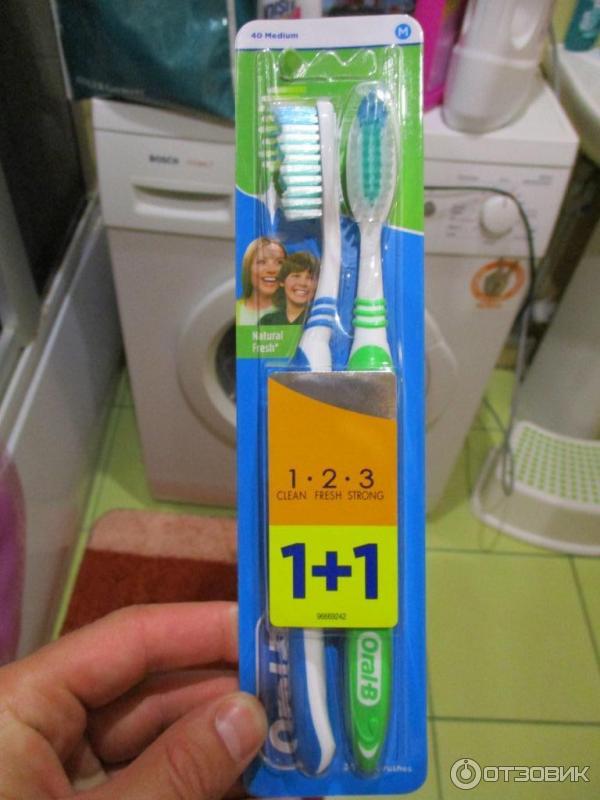 Зубная щетка Oral-B 1-2-3 фото