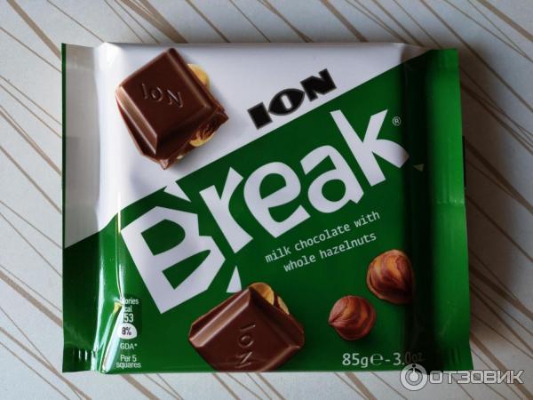 Шоколад молочный ION Break c цельными лесными орехами фото