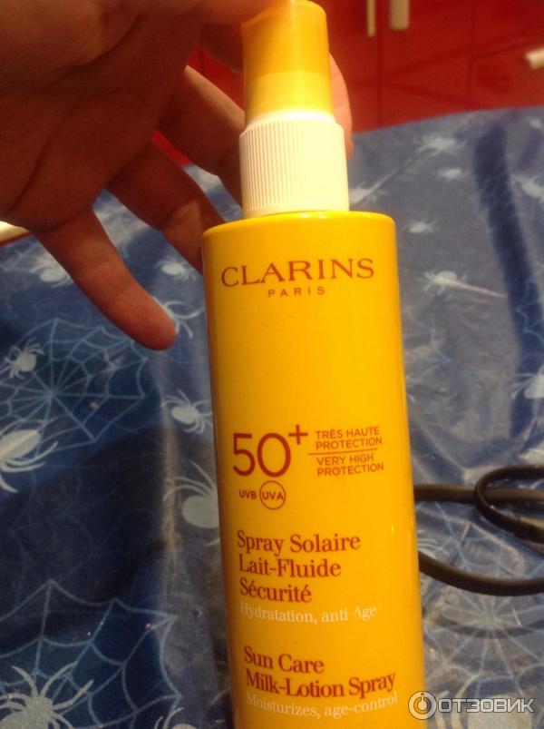 Солнцезащитное молочко-спрей Clarins Spray Solaire Lait-Fluide Securite SPF 50+ фото