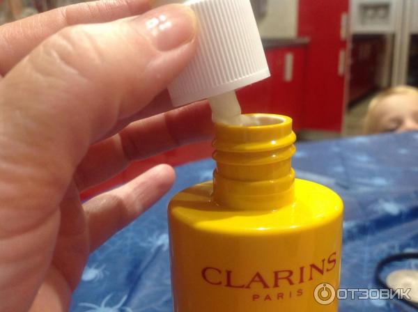 Солнцезащитное молочко-спрей Clarins Spray Solaire Lait-Fluide Securite SPF 50+ фото