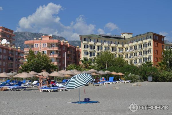 Sun fire beach турция. Сан фаер Бич Турция. Sun Fire Beach Hotel 4. Sun Fire Beach Hotel 4 Махмутлар. Отель кальмар Бич Мармарис